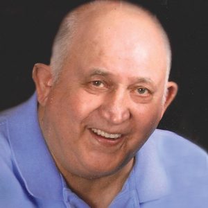 JOHN W. BENISH