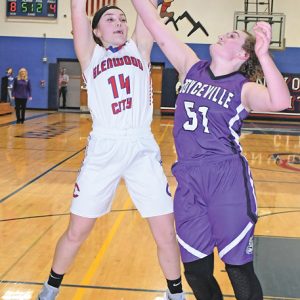BATTLE FOR THE REBOUND — The Toppers' Hanna Strehlo (left) and the Bulldogs' Ana Evenson battled for a rebound when Glenwood City hosted Boyceville for a Dunn-St. Croix girls' basketball game last Friday, January 25. The Bulldogs avenged an earlier loss to the Hilltoppers, winning the game 49-30. —photo by Shawn DeWitt