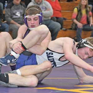 MAJOR DECISION — Boyceville freshman Tyler Dormanen looked to collect some more points against the Saints' Caleb Steffen during the opening match in last Wednesday's WIAA Division 3 team wrestling championship dual in Ladysmith. Dormanen blanked Steffen 10-0 in the 132-pound bout but Bocyeville lost to St. Croix Falls 42-31. It was the Saints second straight sectional championship. —photo by Shawn DeWitt