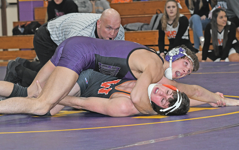 SENIOR Nick Goodell gave Boyceville a win at 145 pounds during the Bulldogs' 68-6 win over Whitehall in the semifinals of the WIAA Division 3 Team Wrestling Sectional in Ladysmith last Wednesday, February 13. Goodell scored a 12-0 major decision over Whitehall's Michael Poulos in the match. —photo by Shawn DeWitt