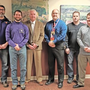 NEW SUPERINDENT SELECTED — In a special meeting Monday morning, February 18, the Board of Education for the Boyceville Community School District approved the hiring of current Tiffany Creek Elementary principal Nick Kaiser to succeed Kevin Sipple, who will be retiring at the end of June, as the district's administrator. Kaiser will assume superintendent duties on July 1 but will be working with Sipple over the next few months to make a smooth transition. Pictured with Nick Kaiser (fourth from the left) is the five members of the Boyceville Board of Education. From left to right are: Erik Evenson, Peter Score, Tim Sempf, Nick Kaiser, Steve Bird and Jeremy Mittlestadt. —photo submitted