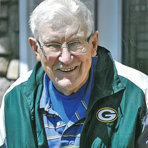 HARLAN E. TIBERG