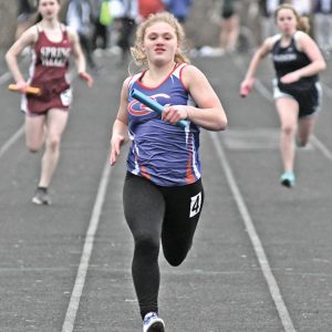 FINAL FEW METERS - Glenwood City freshman Brenna Schwartz prepared to cross the finish line in the girls' 4x100 meter relay race. Schwartz along with Sam Peterson, Alex Swanepoel and Isabel Christmas finished ninth in the race at the St. Croix Central Invitational held Thursday, April 4 in Hammond. —photo by Shawn DeWitt