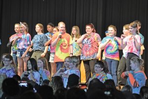 DANCE EVOLUTION — The 6th to 8th grade choirs performed "Dance Evolution" during Spotlight Night at the Colfax High School Martin Anderson Gymnasium April 5. Spotlight Night is a fundraiser for music camp scholarships for Colfax students. — Photo by LeAnn R. Ralph