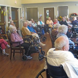 Residents enjoying the sounds of the Dunn County Bell Ringers. —photo submitted