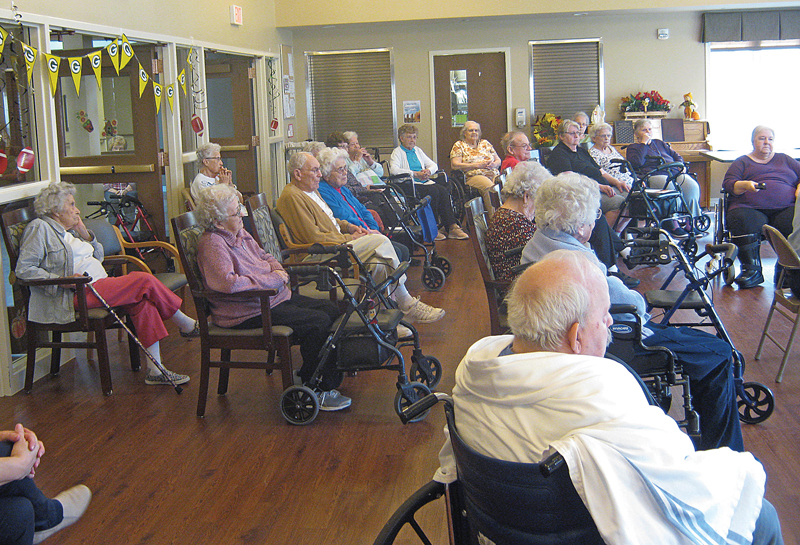 Residents enjoying the sounds of the Dunn County Bell Ringers. —photo submitted