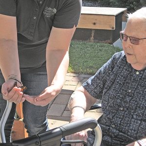 Helping to release the Monarchs in our courtyard.