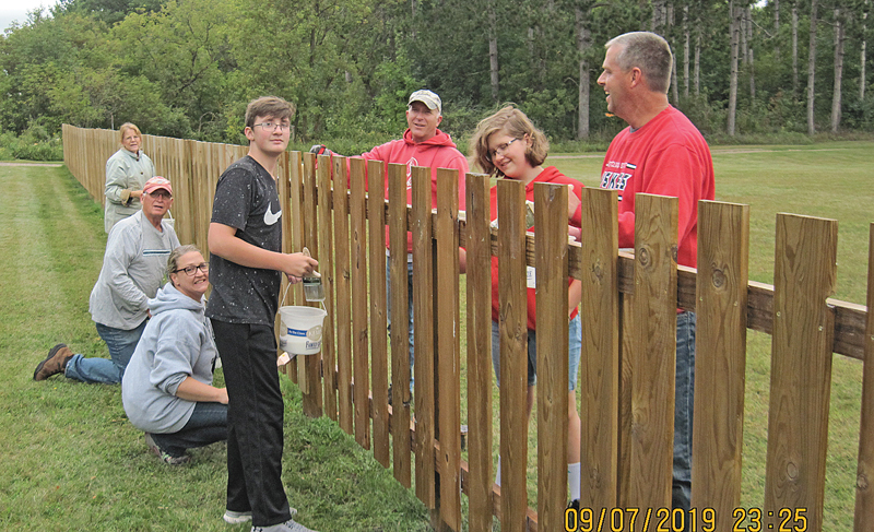God's Work Our Hands fence photo