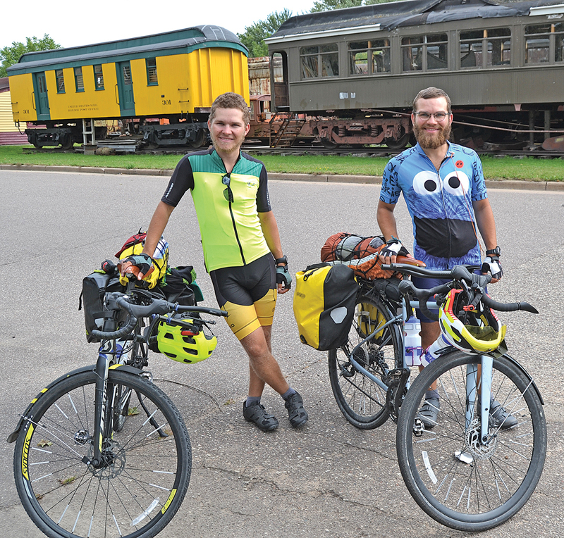 Van den berg bicyclists vist Colfax Messenger Office
