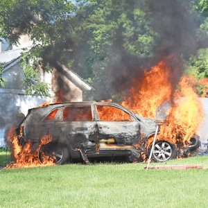 FLAMES consumed this minivan at a residence in the Village of Downing Saturday, August 15. The Glenwood City Fire Department was paged to 506 Wilson Street in Downing shortly before 10:00 a.m. for a car fire and arrived on scene to find the vehicle, owned by Amy Steies, fully engulfed in flames. It took only a few minutes to extinguish the blaze but the vehicle was a total loss. —photo by Shawn DeWitt