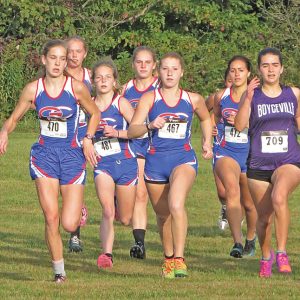 AND THEY ARE OFF — A large group of Glenwood City girls that also included a Boyceville runner sprinted away from the starting line at last Thursday’ D-SC West Pod cross country meet at Glen Hills County Park. From left to right are: Bella Simmons, Natelle McCarthy, Savanna Millermon, Kinzie Strong, Kendall Schutz, Ella Knops and Shiloh Wheeldon. Simmons, Schutz and Strong finished the race first, second and third respectively. —photo by Amy Corr