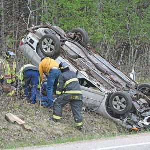 ONE PERSON WAS TRAPPED in this vehicle that rolled over after leaving the roadway of Highway 128 south of Glenwood City near Glen Meadows Lane early Monday morning, May 3rd. According to the Glenwood City Police Department, the driver of the vehicle was 53 year-old Anthony Brown of 405 Maple Street, Glenwood City and his passenger was Kayla Brown, 30. The driver was issued three citations, one for inattentive driving, no driver’s license and no insurance. Assisting at the scene was the Glenwood City Ambulance, Fire Department, St. Croix County Sheriff’s Department and Wisconsin State Patrol. —photo by Shawn DeWitt