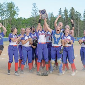CELEBRATION TIME — Members of the Glenwood City softball team celebrated their regional championship win over Cadott last Wednesday, June 16. Players held up the regional championship plaque after defeating the Hornets 10-1 to win their second consecutive regional crown. —photo by Jacob Maes Photography