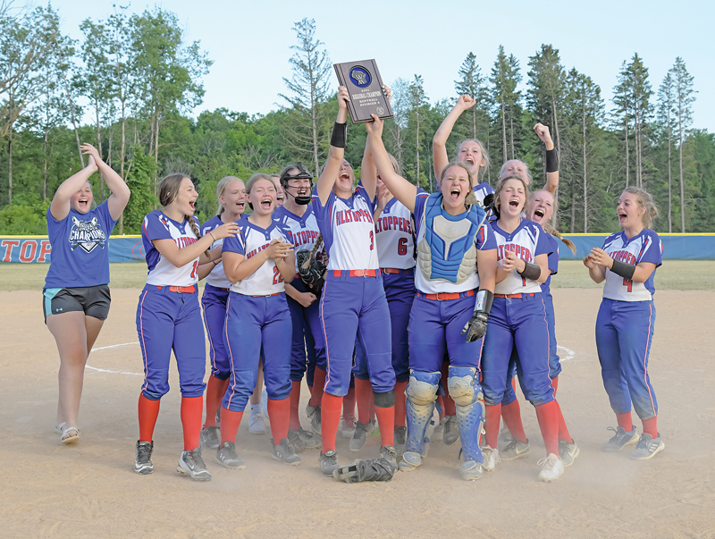 CELEBRATION TIME — Members of the Glenwood City softball team celebrated their regional championship win over Cadott last Wednesday, June 16. Players held up the regional championship plaque after defeating the Hornets 10-1 to win their second consecutive regional crown. —photo by Jacob Maes Photography