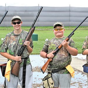 COLFAX Scholastic Trap Team members at the national shoot were (from left to right) Alex Johnson, rookie; Nokomis Nosker, senior varsity; Beaumont Zelm, rookie; Patrick Hafemann, intermediate/advanced. There were as many adults in Ohio providing support was team members, including volunteers Kyle McLain and Autumn Wildfeuer, assistant coach Michael Hafemann, and head coach Jim Nosker. Nokomis Nosker is also a registered assistant coach. —photo submitted