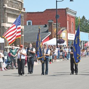 VETERANS AND MEMBERS of the local American Legion and AMVETS posts led the annual Boyceville Cucumber Festival Parade which marked its 50th year this past weekened - August 20-22. —photo by Shawn DeWitt