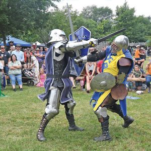 BATTLE ROYALE — A pair of Knights did battle during a medieval tournament held Sunday at the Ren in the Glen. Over 3,000 people attended the two-day renaissance faire held July 31 and August 1 in the Town of Glenwood. —photo by Shawn DeWitt