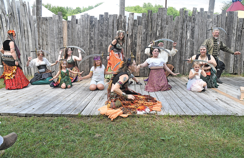 PRACTICE MAKES PERFECT — Under the direction and assistance of the dance caravan, volunteers worked to perfect their sword dancing skills on the Bonnie Brae Stage Sunday afternoon, August 1 at the 2021 Ren in the Glen. —photo by Shawn DeWitt