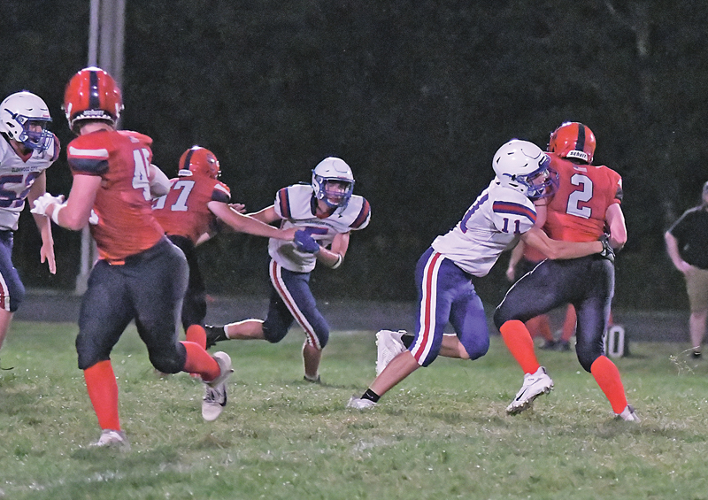SACK TIME — Hilltopper junior Brady Klatt (#11) registered a sack of Rockets’ quarterback Isaac Mauritz during the season opening football contest in Spencer August 19. Klatt also scored Glenwood City’s first touchdown of the 2021 campaign - an 86-yard scoring pass from Bryce Wickman that gave the Toppers a quick 7-0 lead. Unfortunately, Spencer/Columbus Catholic took advantage of several Glenwood City turnovers to post a 51-28 win. —photo by Shawn DeWitt