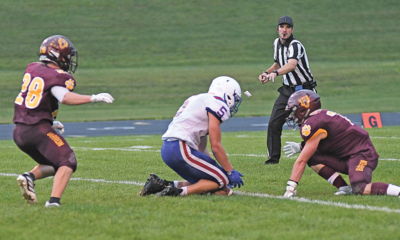 FUMBLE RECOVERY — Glenwood City senior Drew Olson (#5) recovered a fumbled punt reception by Barron during second quarter action in the August 27 non-conference road game. The receovery set up an eventual field goal attempt by Marcis DeSmith. Glenwood City went on to earn a 15-8 win to even their season record at 1-1. —photo by Shawn DeWitt