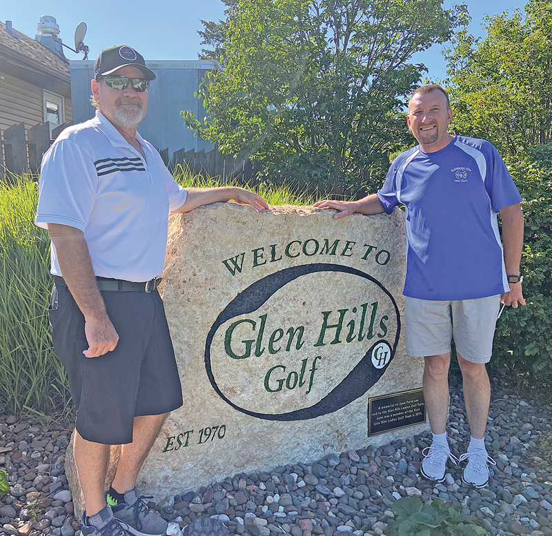 THE GLENWOOD CITY Fire Department received a donation of $500 from Glen Hills Golf Club. The money was part of the proceeds raised during the 25th Annual Leaker’s Big Cup Tourney which was held August 6th at Glen Hills Golf Club and featured 108 golfers. Many local sponsors make it possible for the Golf Club to donate money every year from the tournament which was started and is supported by Larry and Cheryl Standaert. In addition to the Glenwood City Fire Departent, West Cap’s Back-to-School program, which helps purchase school supplies for local kids, and the Boyceville Fire Department each received 500.00 donations as well. The tournament also received a $500 donation from Larry McNamara of the Forest Ridge Hunt Club. Pictured above is Tim Mahoney (left), President of the Glen Hills Golf Club and Greg Holden, Glenwood City Fire Chief. —photo submitted