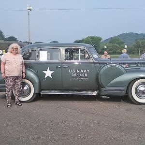 GLENWOOD CITY resident Lois Kilde had her picture taken in front of a World War II vintage military vehicle when the Military Vehicle Preservation Association (MVPA) conoy, which is a highlight of the 2021 Yellowstone Trail Heritage Days Celebration, stopped for a break at Knapp Memorial Park last Saturday morning, July 31. The convoy features privately-owned and restored trucks, jeeps, ambulances, troop and equipment carries, and other transports that are driving cross-country for 23 days on the Yellowstone Trail (US Highway 12). The convoy started in Aberdeen, South Dakota and will end in Ohio. The St. Croix County leg of the journey took place this past Friday and Saturday, July 30 and 31, as the convoy passed through Hudson, Roberts, Hammond, Baldwin, Woodville, and making a brief stop in Knapp before continuing on. —photo submitted