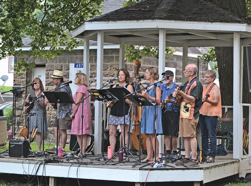 UKULELE KLUB — Music in the Park in Tower Park next to the Colfax Municipal Building featured the Ukulele Klub out of Eau Claire on Thursday evening, July 29. Music In the Park is sponsored by the Colfax Woman’s Club. The Ottersons will play August 5. —photo by LeAnn R. Ralph