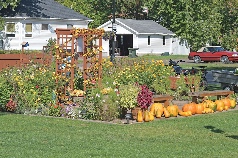 FRIENDSHIP GARDEN in Boyceville has taken on a dinstinctive fall theme with pumpkins and colorful foliage. September 22 marks the start of fall. —photo by Shawn DeWitt
