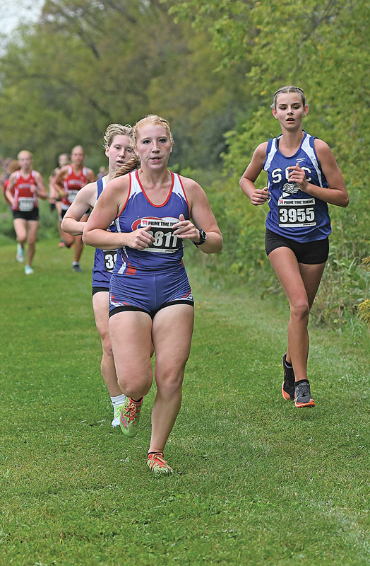 GLENWOOD CITY senior Kendall Schutz neared the two-mile mark in a cross country race at St. Croix Central September 2. Schutz, who ran a 22:25.1, finished tenth for the Lady Toppers who placed fifth as a team. —photo by Shawn DeWitt