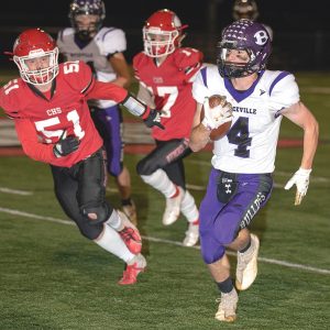 FIRST-DOWN RUN — Nicholas Olson (#4) breaks free for a first down during Boyceville WIAA Division 6, level 1 playoff win in Cumberland October 22. —photo by Josh Johnson
