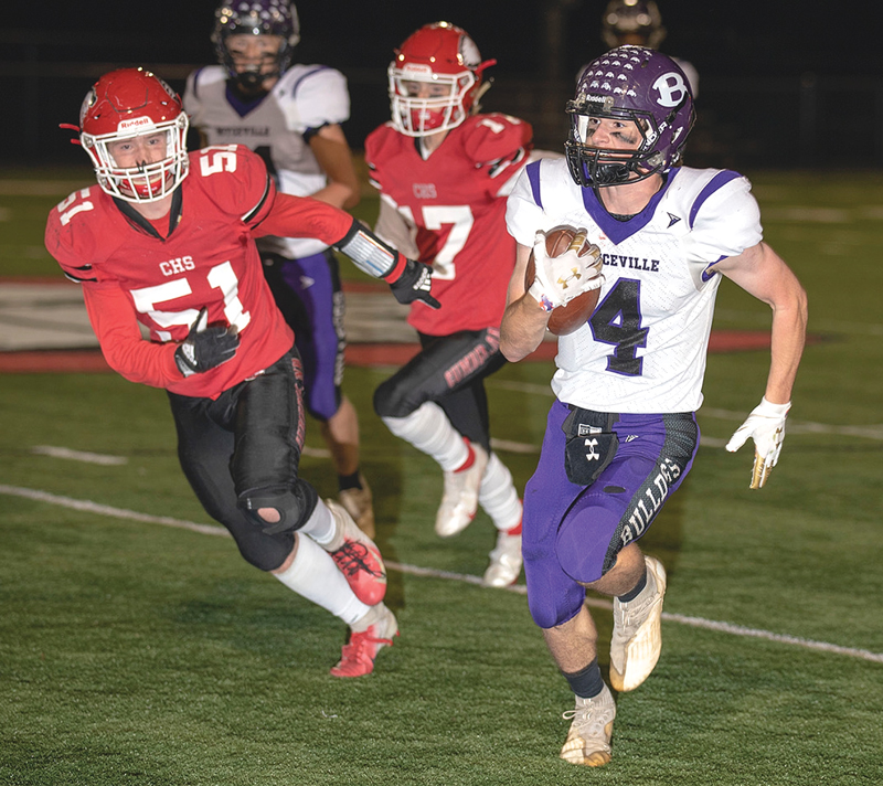 FIRST-DOWN RUN — Nicholas Olson (#4) breaks free for a first down during Boyceville WIAA Division 6, level 1 playoff win in Cumberland October 22. —photo by Josh Johnson