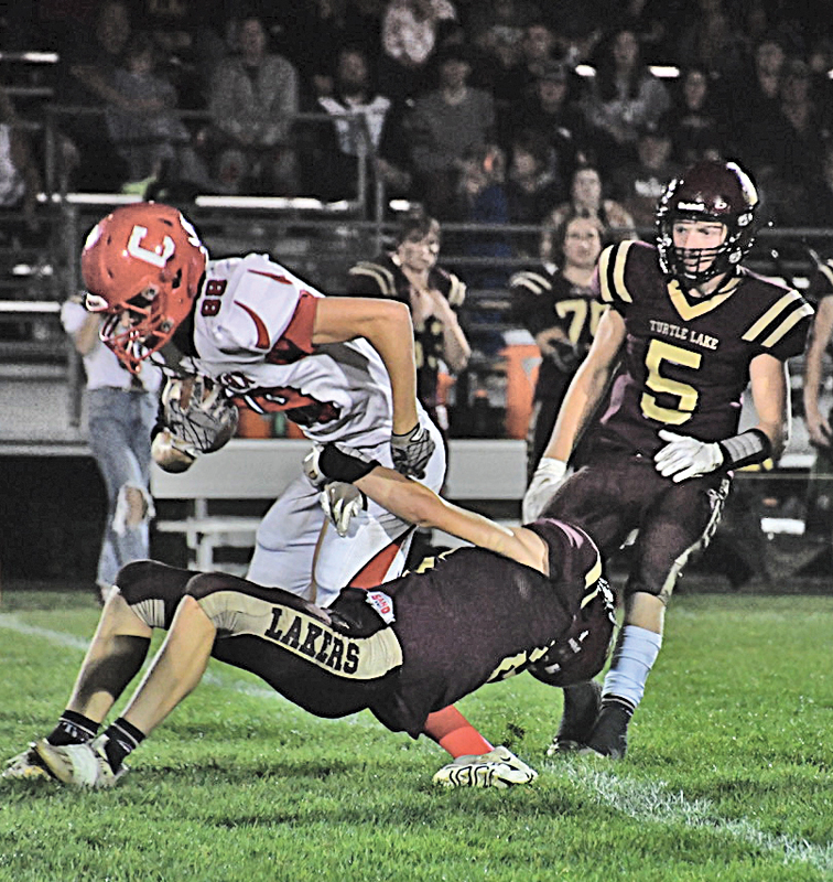 COLFAX receiver Tristan Lenz (#88) ran for several yards after snagging a pass during the game at Turtle Lake October 1. —photo by Tucker Hovde