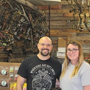 BAIT & BOW — Owners of the Glenwood Bait & Bow shop in Glenwood City Sean and Miranda Lybert are pictured in their shop just south of Glenwood City on Hwy 128/Syme Avenue. —photo by Missy Klatt