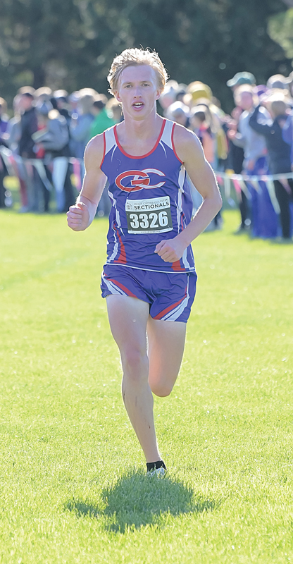 HEADING TO THE FINISH — Glenwood City senior Austin Nelson ran toward the finish in last Saturday’s cross country sectional meet in Boyceville. Nelson placed fifth to advance to state. —photo by Jacob Maes Photography