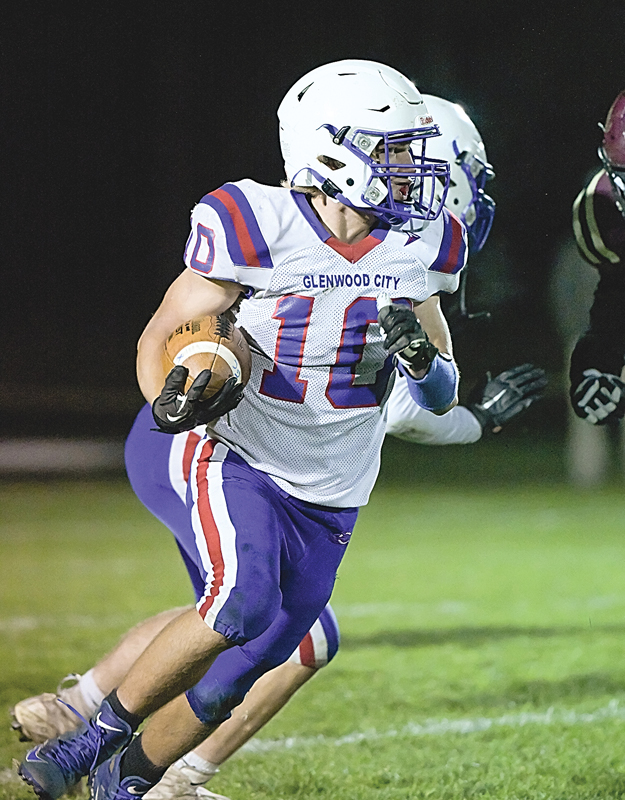 WORK HORSE — Glenwood City’s Max Janson ran the ball 24 times for 94 yards to lead the Hilltoppers to a 9-0 road playoff win against Turtle Lake October 22. —photo by Jacob Maes Photography