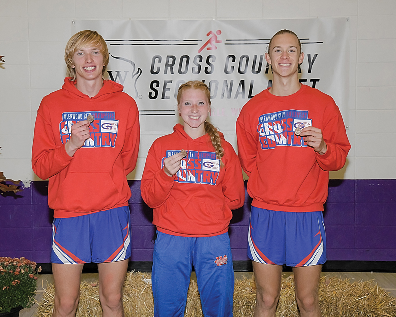 THREE TOPPERS HEADED TO STATE — Glenwood City had three runners qualify for the state cross country championships following the October 23 Division 3 sectional meet in Boyceville. Competing in Wisconsin Rapids this Saturday, October 30 will be, from left to right, Austin Nelson, Kendall Schutz and JJ Williams. See sports for complete story and more photos. —photo by Jacob Maes Photography