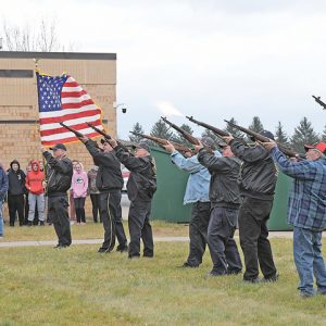 21-GUN SALUTE — Members of the Connorsville AMVETS Post 72 and the Wheeler VFW Post 10424 fired a 21-gun salute at the conclusion of a Veterans’ Day program held at Tiffany Creek Elementary in Boyceville Thursday afternoon, November 11. —photo by Shawn DeWitt
