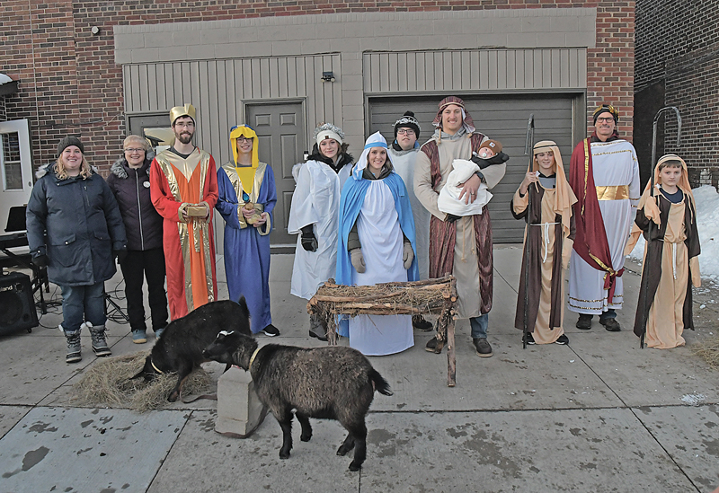 AFTER A ONE-YEAR hiatus due to COVID-19, Boyceville’s Ministerial Association once again reprised its popular Live Nativity Scene during this year’s “Spirit of Christmas” community celebration held Saturday, December 11. It was the organization’s 20th annual re-enactment of the birth of Jesus Christ which drew a large audience to witness the event. The 2021 Live Nativity cast and crew, pictured above in no particular order, included Levi and Marki Wolf (Joseph and Mary), Garrett Wolf (Baby Jesus), Charlie and Skyler Hall (angels), Jaxin Olson and Charlie Bogie (shepherds), Pastor Kevin Hagen, Nick Adams and Marik Ebensperger (wise men), Pastor Steve Boyd (Caesar) and Pastor Vicky Strupp and Katie Wagner (narrators). Not pictured is accompanist Ginny Waller. —photo by Shawn DeWitt