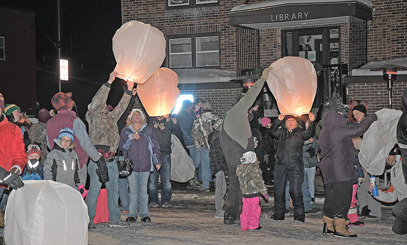 DOZENS of Love Laterns were lit in memory of loved ones during Saturday’s Spirit of Christmas event in Boyceville. —photo by Shawn DeWitt