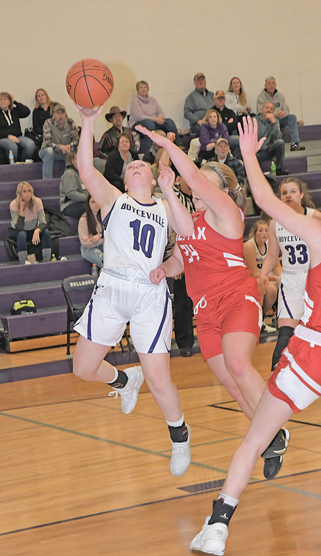 GOING IN for the one-handed layup was Boyceville senior Harper Olson (#10) during last Friday’s home game against Colfax. OIson finished with four points. —photo by Shawn DeWitt