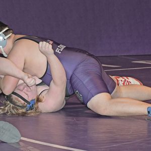 PINNED — Boyceville senior heavyweight, Keegan Plemon, scored a first-period pin on Colfax’s Dylyn Hiitola during the Bulldogs’ December 16 home dual with Bloomer/Colfax. —photo by Shawn DeWitt