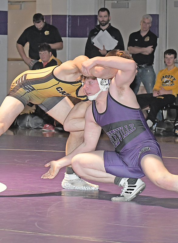 BOYCEVILLE senior Nick Hillman (bottom) shot down low for an attempted takedown during his 160-pound match against Cole Pfeiffer last Thursday, December 9 in Boyceville. Pfeiffer eventually scored a pin in the second period for the win. —photo by Shawn DeWitt