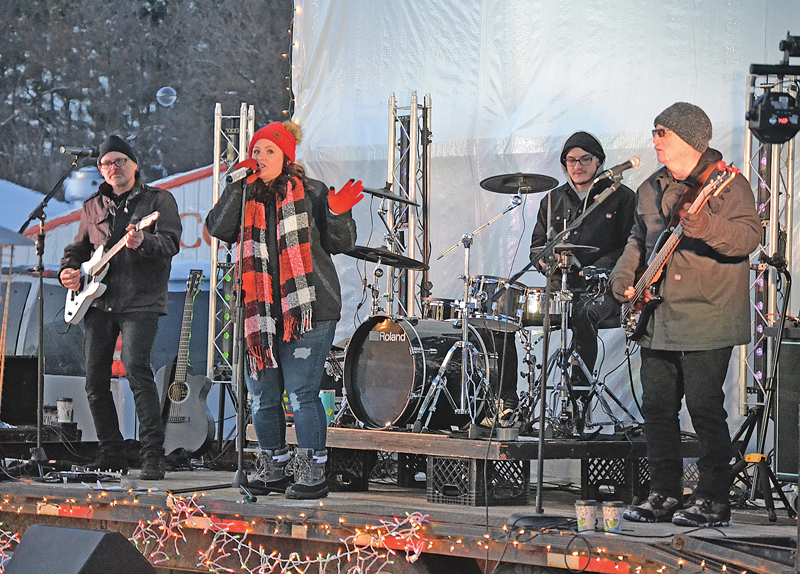 IN CONCERT — EverRoad played at the Colfax Fairgrounds for the Colfantastic Light Up Colfax event on December 11. —photo by LeAnn R. Ralph 