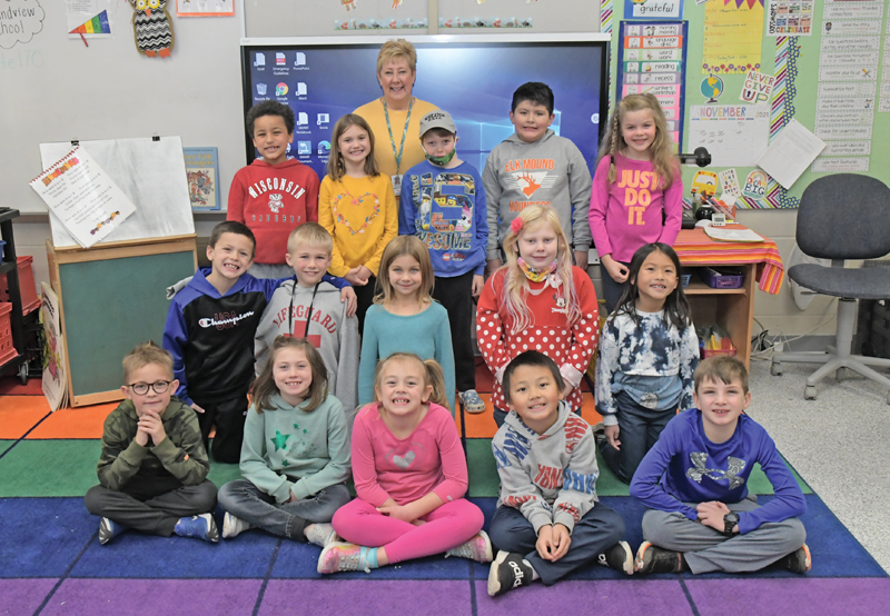 MRS. PETERSON’S 2ND GRADE CLASS — Front row (L to R): Cole Renz, Noveli Schneiderman, Shelby Turner, Malachi Vang and Evan Wolf. Middle row (L to R): Max Glaus, Camden Hahn, Sophie Hoeft, Brianna Johnson and Cienna Lor. Back row (L to R): Elijah Adler, Ivy Bodenburg, Mrs. Peterson, Regan Books, Junior Delgado Sanchez and Violet Edin. Not pictured are Wyatt Grinder and Scarlett Xiong. —photo by Shawn DeWitt