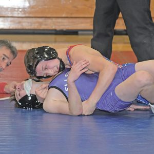 IN CHARGE — Toppers’ freshman Wyatt Unser scored back points on his Ellsworth opponent Noah Walker during a triangular meet in Glenwood City December 17. Unser won a 17-1 technical fall in the match at 106 pounds. —photo by Shawn DeWitt