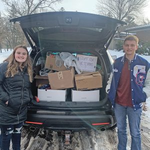 THE GLENWOOD CITY US History Club collected donations of non-perishable food and personal hygiene items in conjunction with Veterans Day. Over $2000 worth of products were collected in the school district. Above, History Club members Emma Lamb (left) and Brendan Booth helped deliver the donations to the Veterans Housing and Recovery Program Center in Chippewa Falls. This center serves veterans in all of Western Wisconsin. —photo submitted