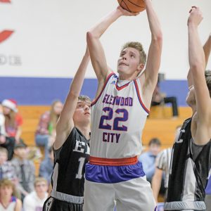 GLENWOOD CITY junior Elek Anderson scored a basket during the Hilltoppers home conference game against Elmwood/Plum City December 14. —photo by Jacob Maes Photography