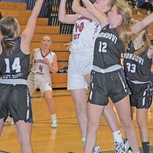 HACKED — The Toppers’ Kaylynn Kurtz (#40) was fouled by a Mondovi player while shooting the ball. Kurtz finished with seven points in the January 6 game which the Buffaloes won 65-25. —photo by Shawn DeWitt