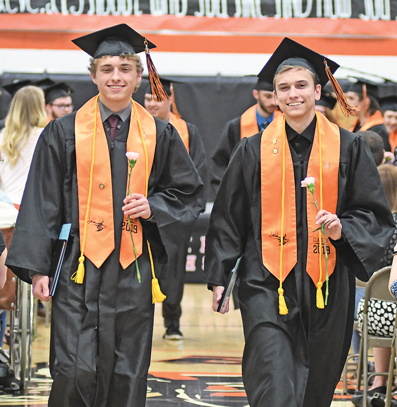 A pair of graduates at 2019 Elk Mound Graduation